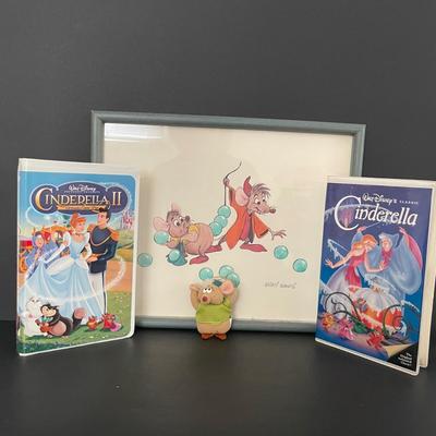LOT 25: Vintage Cinderella and Cinderella II VHS Tapes with a Collector’s Edition Reproduction of an Animation Sketch from Cinderella...