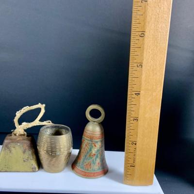 LOT32: Big Brass Collection Featuring a Brass Cat Door Stop, Candle Stick Solders, Bells. Basket and More