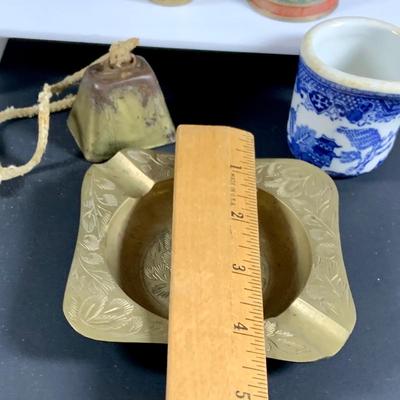 LOT32: Big Brass Collection Featuring a Brass Cat Door Stop, Candle Stick Solders, Bells. Basket and More