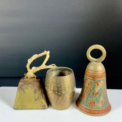 LOT32: Big Brass Collection Featuring a Brass Cat Door Stop, Candle Stick Solders, Bells. Basket and More