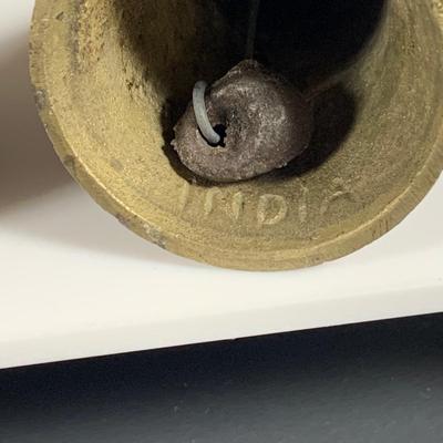 LOT32: Big Brass Collection Featuring a Brass Cat Door Stop, Candle Stick Solders, Bells. Basket and More