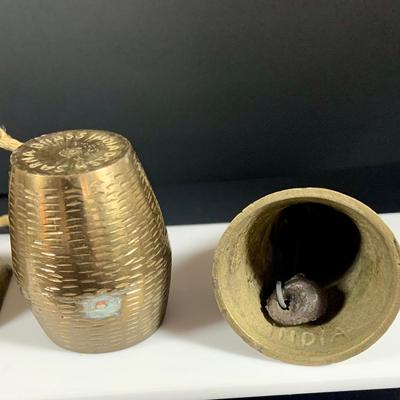 LOT32: Big Brass Collection Featuring a Brass Cat Door Stop, Candle Stick Solders, Bells. Basket and More