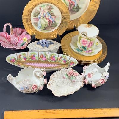 LOT 41: Victorian Collection Featuring Gold Rimmed French Garden Dinner Plate and Cookie Plates, Swans with Roses, Leaf Bowls by Lefton...
