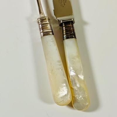 LOT 43: Collection of Crystal and Other Serving Essentials, Including a Crystal Pitcher, Salt and Pepper Shakes, Covered Butter Dish,...