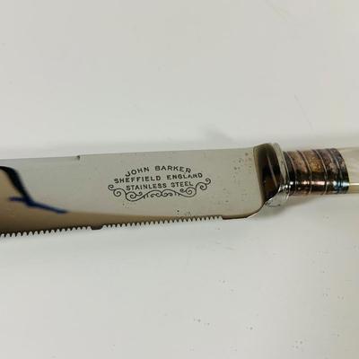 LOT 43: Collection of Crystal and Other Serving Essentials, Including a Crystal Pitcher, Salt and Pepper Shakes, Covered Butter Dish,...