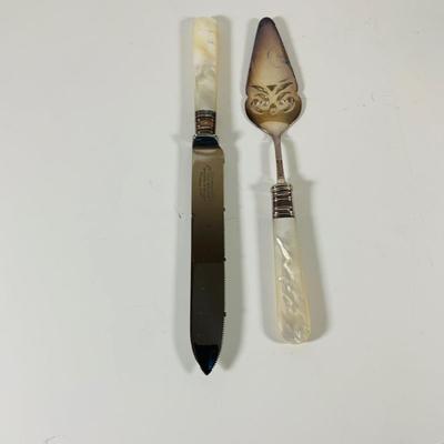 LOT 43: Collection of Crystal and Other Serving Essentials, Including a Crystal Pitcher, Salt and Pepper Shakes, Covered Butter Dish,...