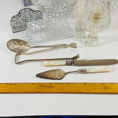 LOT 43: Collection of Crystal and Other Serving Essentials, Including a Crystal Pitcher, Salt and Pepper Shakes, Covered Butter Dish,...