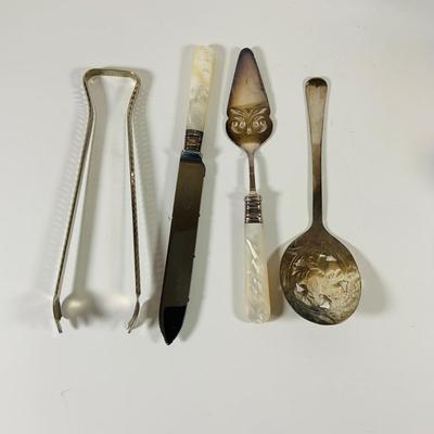 LOT 43: Collection of Crystal and Other Serving Essentials, Including a Crystal Pitcher, Salt and Pepper Shakes, Covered Butter Dish,...