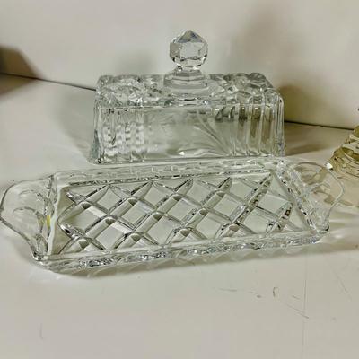 LOT 43: Collection of Crystal and Other Serving Essentials, Including a Crystal Pitcher, Salt and Pepper Shakes, Covered Butter Dish,...