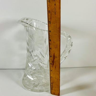 LOT 43: Collection of Crystal and Other Serving Essentials, Including a Crystal Pitcher, Salt and Pepper Shakes, Covered Butter Dish,...