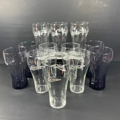 LOT 54: Collection of Vintage Coke - Coca Cola Drinking Glasses - 4 Purple and 8 Clear