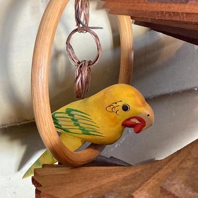 LOT 68: Decorative Vintage Wood Spinners, Carved Parrots and Metal Chimes