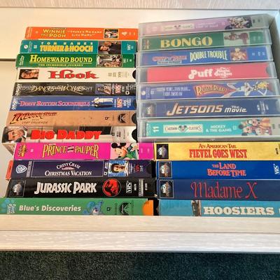 LOT 77: JVC VHS Video Cassette Recorder Player Model No HR-VP48U and Collection of Tapes and CDs