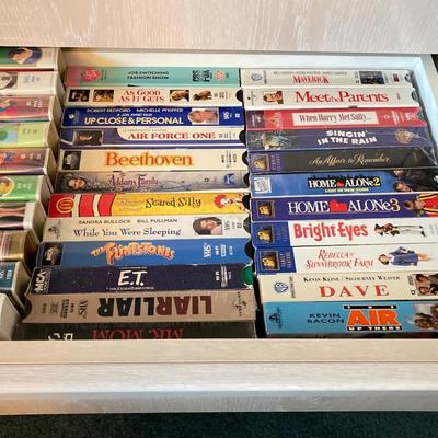 LOT 77: JVC VHS Video Cassette Recorder Player Model No HR-VP48U and Collection of Tapes and CDs