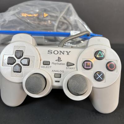 LOT 90: Sony PlayStation SCPH-7001 w/2 Controllers, Memory Card & Cords/Adaptors