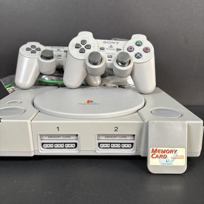 LOT 90: Sony PlayStation SCPH-7001 w/2 Controllers, Memory Card & Cords/Adaptors