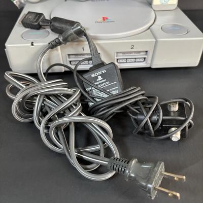 LOT 90: Sony PlayStation SCPH-7001 w/2 Controllers, Memory Card & Cords/Adaptors