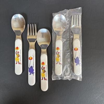 LOT 91: McDonalds Plates & Bowls, Ronald, Big Mac & Grimace Glasses, 1993 Child's Ronald McDonald Spoon & Grimace Fork Set