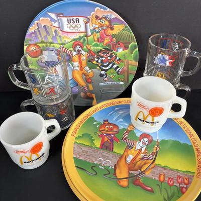LOT 92: McDonalds Anchor Hocking Fire King Mugs, 1984 Olympic Glass Mugs, 1996 Atlanta Olympic Plates & the Four Seasons Plates