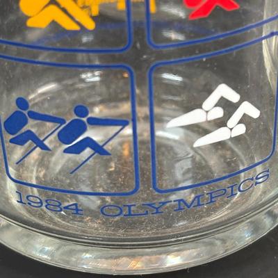 LOT 92: McDonalds Anchor Hocking Fire King Mugs, 1984 Olympic Glass Mugs, 1996 Atlanta Olympic Plates & the Four Seasons Plates