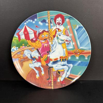 LOT 95: Vintage Grimace & Early Birdie Plush Toys along with McDonalds Plates