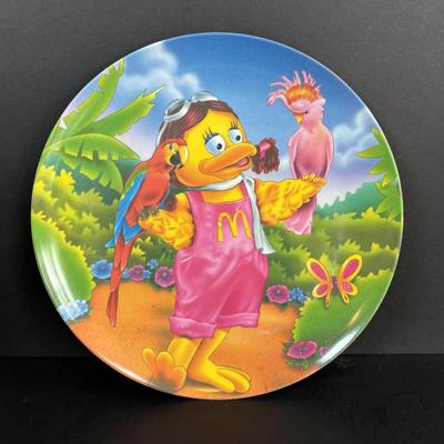 LOT 95: Vintage Grimace & Early Birdie Plush Toys along with McDonalds Plates