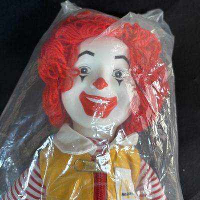 LOT 98: UNOPENED! VINTAGE Ronald McDonald & Early Birdie Plush Toys, French Fry Tote Bag along with a Ronald McDonald Digital Watch
