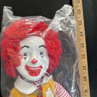LOT 98: UNOPENED! VINTAGE Ronald McDonald & Early Birdie Plush Toys, French Fry Tote Bag along with a Ronald McDonald Digital Watch