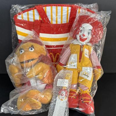 LOT 98: UNOPENED! VINTAGE Ronald McDonald & Early Birdie Plush Toys, French Fry Tote Bag along with a Ronald McDonald Digital Watch