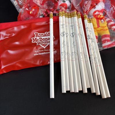 LOT 99: Vintage 1970s Ronald McDonald Plastic Bank, Ceramic Grimace Bank, Digital Watches, Character Pencils in Holder, 2004 Ty McDonalds...