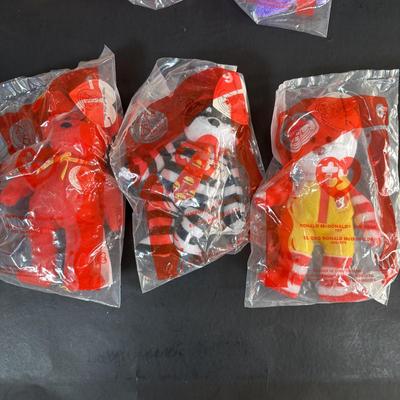 LOT 99: Vintage 1970s Ronald McDonald Plastic Bank, Ceramic Grimace Bank, Digital Watches, Character Pencils in Holder, 2004 Ty McDonalds...