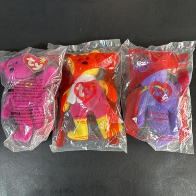 LOT 99: Vintage 1970s Ronald McDonald Plastic Bank, Ceramic Grimace Bank, Digital Watches, Character Pencils in Holder, 2004 Ty McDonalds...