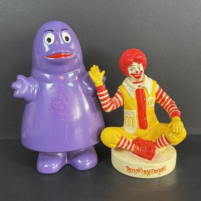 LOT 99: Vintage 1970s Ronald McDonald Plastic Bank, Ceramic Grimace Bank, Digital Watches, Character Pencils in Holder, 2004 Ty McDonalds...