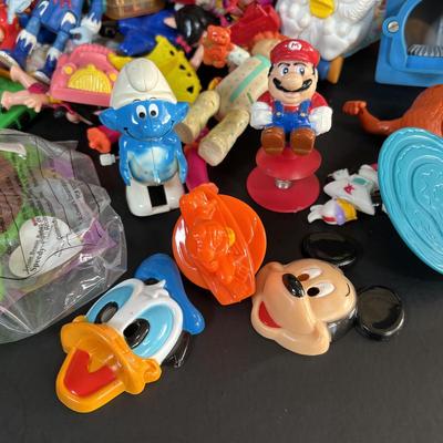 LOT 103: Large Lot of Opened McDonald Happy Meal Toys & More