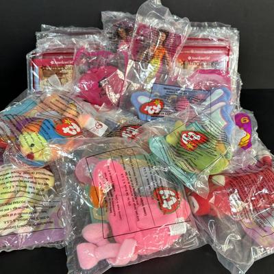 LOT 107: New in Package McDonalds Happy Meal Toys American Girl, Barbie and Ty Teenie Beanie Babies