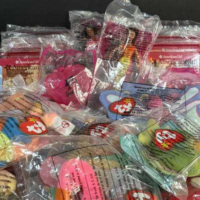 LOT 107: New in Package McDonalds Happy Meal Toys American Girl, Barbie and Ty Teenie Beanie Babies