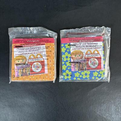 LOT 107: New in Package McDonalds Happy Meal Toys American Girl, Barbie and Ty Teenie Beanie Babies
