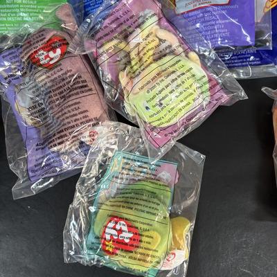 LOT 108: New in Package McDonalds Happy Meal Toys: Complete 2002 Bratz Dolls 1-8 along w/2000 Ty Teenie Beanie Babies Complete Set of 18