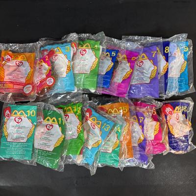 LOT 108: New in Package McDonalds Happy Meal Toys: Complete 2002 Bratz Dolls 1-8 along w/2000 Ty Teenie Beanie Babies Complete Set of 18