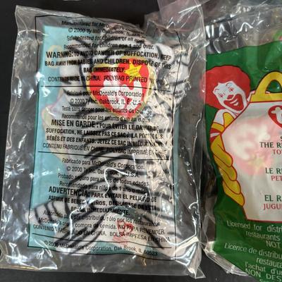 LOT 108: New in Package McDonalds Happy Meal Toys: Complete 2002 Bratz Dolls 1-8 along w/2000 Ty Teenie Beanie Babies Complete Set of 18