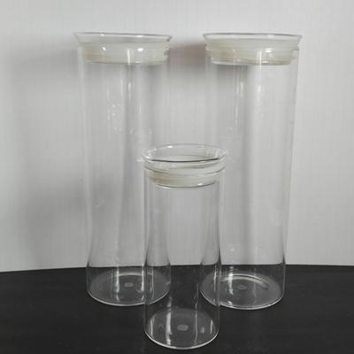 LOT 111: Oversized Centerpiece Champagne Glasses, Silver Trays, Zens Glass Canister Set, Hand Wrought Creations by Rodney Kent Trays...