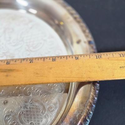 LOT 111: Oversized Centerpiece Champagne Glasses, Silver Trays, Zens Glass Canister Set, Hand Wrought Creations by Rodney Kent Trays...