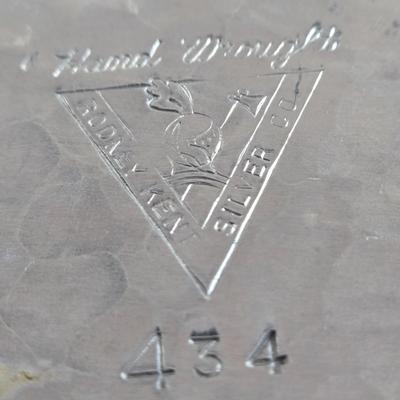 LOT 111: Oversized Centerpiece Champagne Glasses, Silver Trays, Zens Glass Canister Set, Hand Wrought Creations by Rodney Kent Trays...