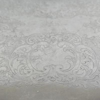 LOT 111: Oversized Centerpiece Champagne Glasses, Silver Trays, Zens Glass Canister Set, Hand Wrought Creations by Rodney Kent Trays...