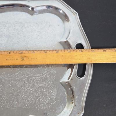 LOT 111: Oversized Centerpiece Champagne Glasses, Silver Trays, Zens Glass Canister Set, Hand Wrought Creations by Rodney Kent Trays...