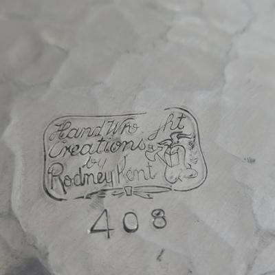 LOT 111: Oversized Centerpiece Champagne Glasses, Silver Trays, Zens Glass Canister Set, Hand Wrought Creations by Rodney Kent Trays...