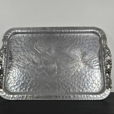 LOT 111: Oversized Centerpiece Champagne Glasses, Silver Trays, Zens Glass Canister Set, Hand Wrought Creations by Rodney Kent Trays...