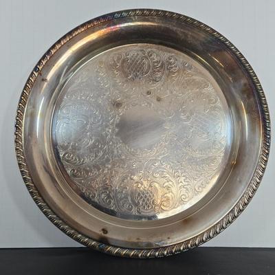 LOT 111: Oversized Centerpiece Champagne Glasses, Silver Trays, Zens Glass Canister Set, Hand Wrought Creations by Rodney Kent Trays...