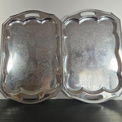 LOT 111: Oversized Centerpiece Champagne Glasses, Silver Trays, Zens Glass Canister Set, Hand Wrought Creations by Rodney Kent Trays...