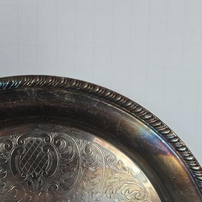 LOT 111: Oversized Centerpiece Champagne Glasses, Silver Trays, Zens Glass Canister Set, Hand Wrought Creations by Rodney Kent Trays...